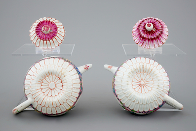 A pair of Chinese famille rose teapots on stand, Yongzheng/Qianlong, 18th C.